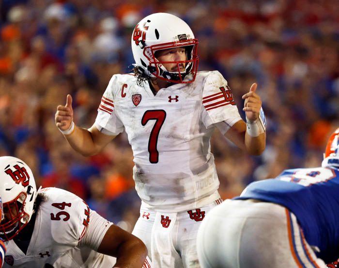Utah Utes quarterback Cameron Rising (7) calls a play against the Florida Gators during the second half at Steve Spurrier-Florida Field.
